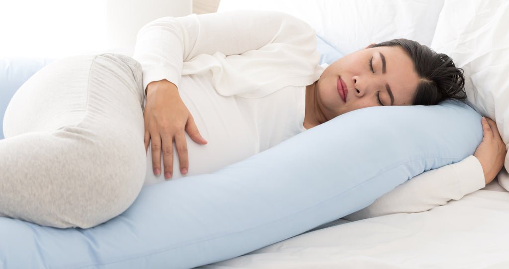 Learn How To Use A Pregnancy Pillow To Promote Better Sleep - Cheer Collection