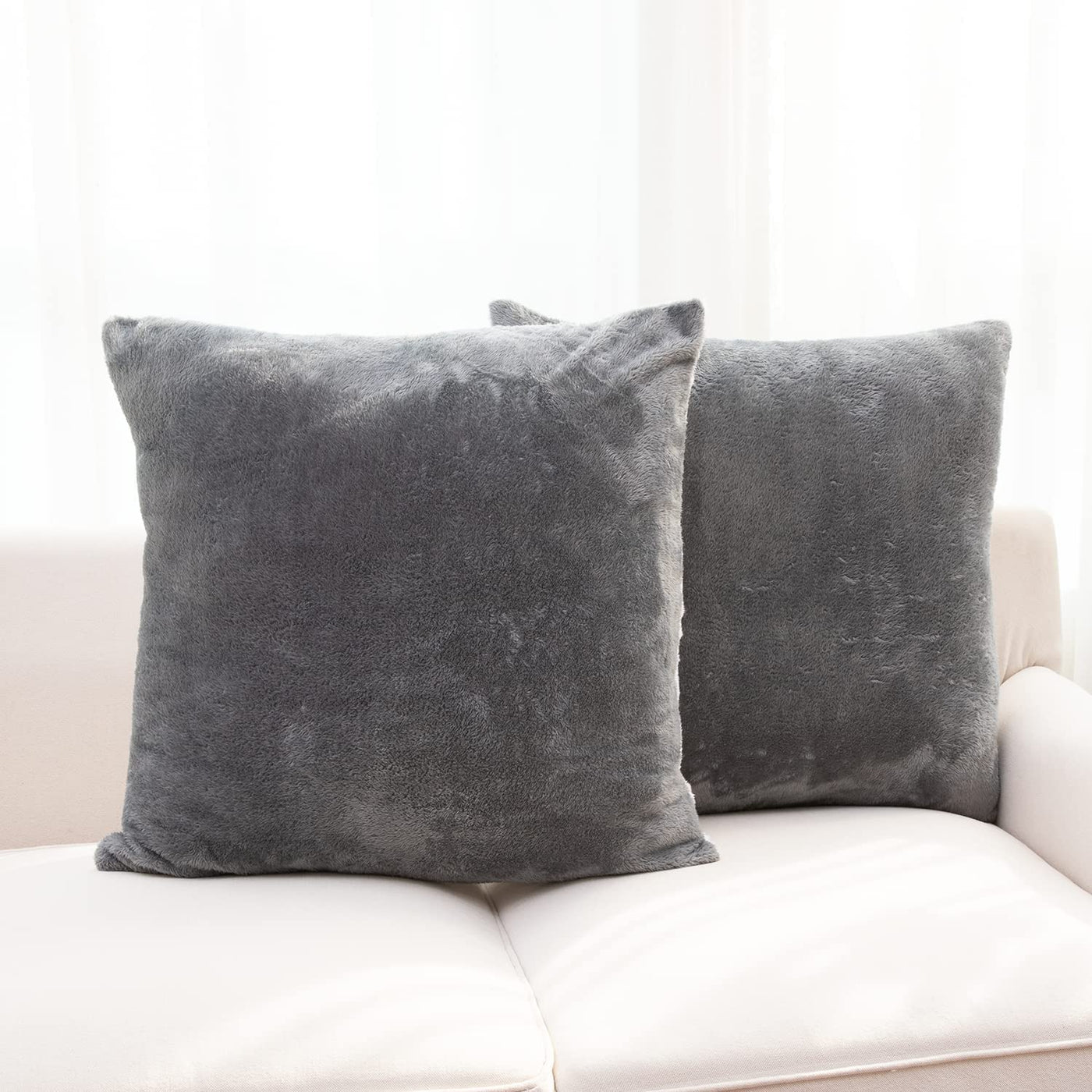 https://www.cheercollection.com/cdn/shop/products/cheer-collection-microsherpa-throw-pillow-ultra-soft-and-fluffy-elegant-home-decor-velvet-stylish-accent-pillows-18-x-18-set-of-2-158162_1400x.jpg?v=1678133846